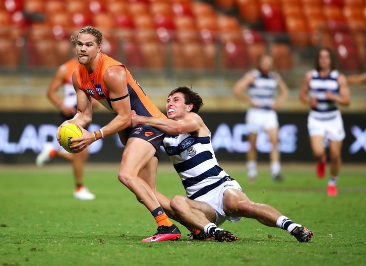 Jack Henry tackles his opponent